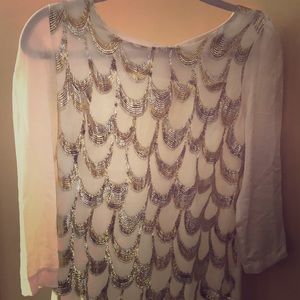 Under skies gold and silver dress